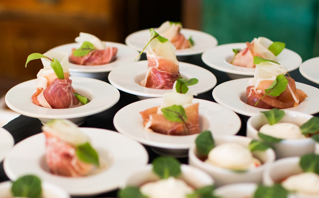 Catering staff plating and setting up service for a corporate banquet
